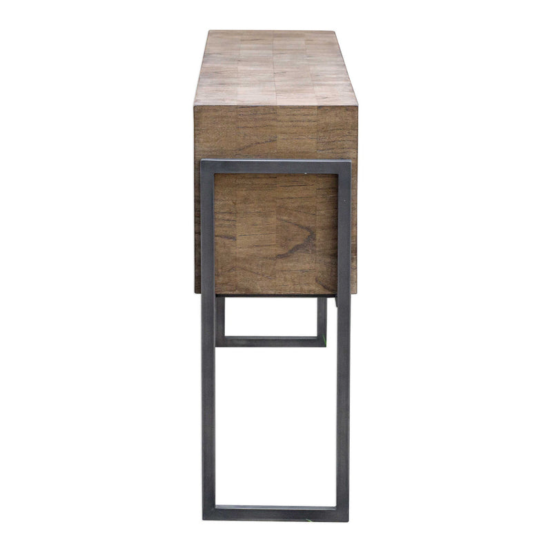 Contemporary Nevis console table by Uttermost with a light brown finish, featuring a sleek design and smooth surface.