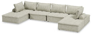 Stationary sectional sofa from Signature Design by Ashley®, featuring plush cushions and modern design in a neutral fabric.