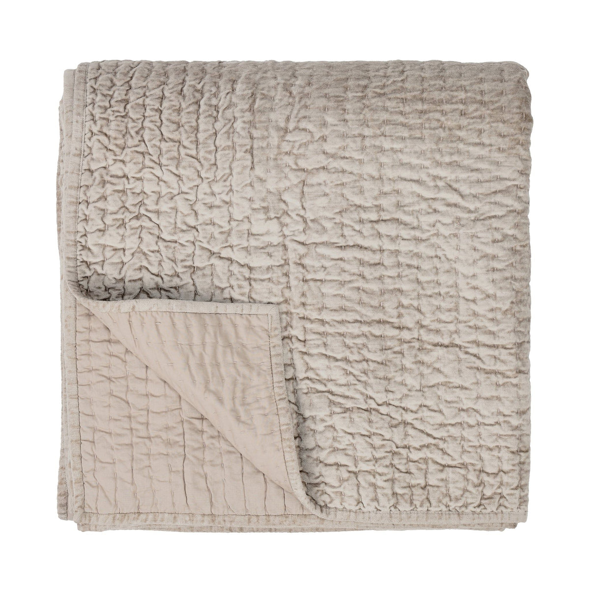 Velvet quilt set by Classic Home featuring soft, luxurious fabric with matching shams, in elegant green color.