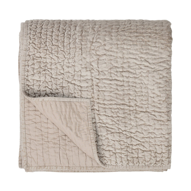 Velvet quilt set by Classic Home featuring soft, luxurious fabric with matching shams, in elegant green color.