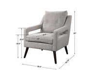 Uttermost O'Brien armchair with plush fabric upholstery and elegant wooden legs, showcasing a stylish and comfortable seating option.