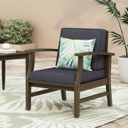 Dark gray Noble House outdoor club arm chair with slat panel design and water-resistant cushion, perfect for patio lounging.