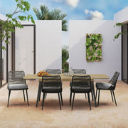 Beachside outdoor extendable dining table by Simpli-Home in light teak wood, showing its lengthened and compact positions.