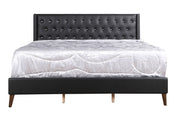 Contemporary upholstered bed by Glory Furniture with a spacious design, featuring a plush headboard and sleek modern style.
