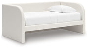 Upholstered Signature Design by Ashley Arloster day bed with plush fabric, wooden frame, and cushioned backrest, ideal for lounging.