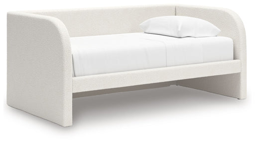 Upholstered Signature Design by Ashley Arloster day bed with plush fabric, wooden frame, and cushioned backrest, ideal for lounging.