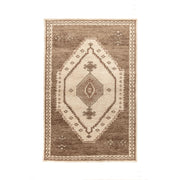 Hand-knotted Luxor area rug by Classic Home featuring intricate patterns and rich colors, perfect for adding elegance to a living space.
