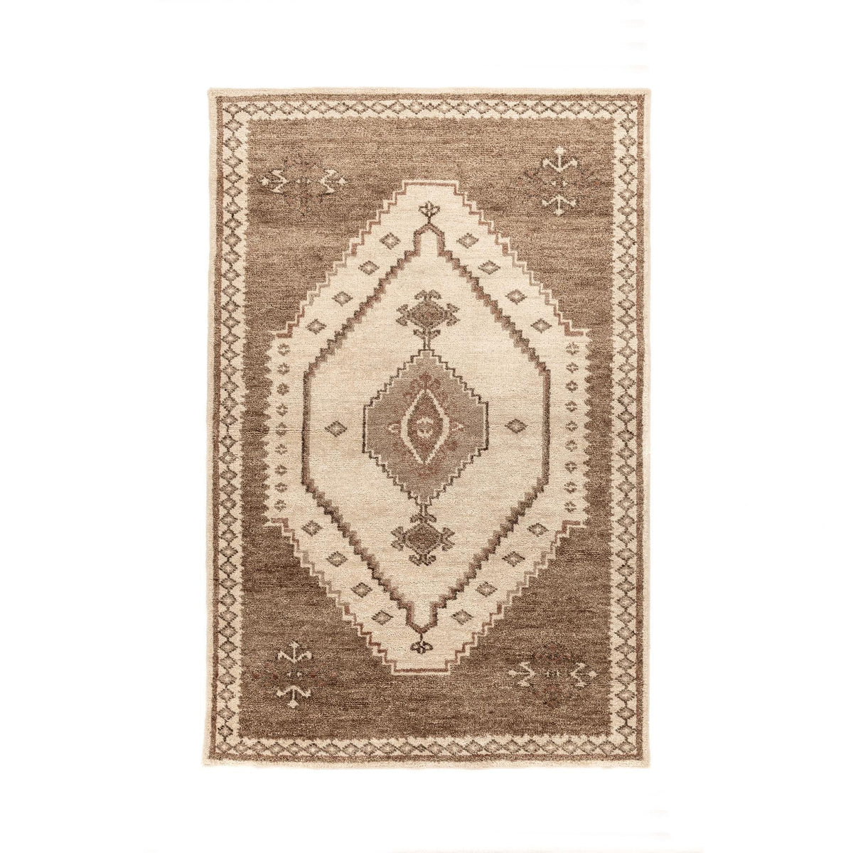 Hand-knotted Luxor area rug by Classic Home featuring intricate patterns and rich colors, perfect for adding elegance to a living space.
