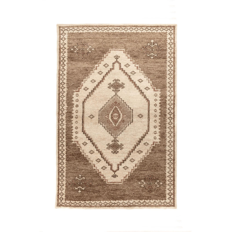 Hand-knotted Luxor area rug by Classic Home featuring intricate patterns and rich colors, perfect for adding elegance to a living space.