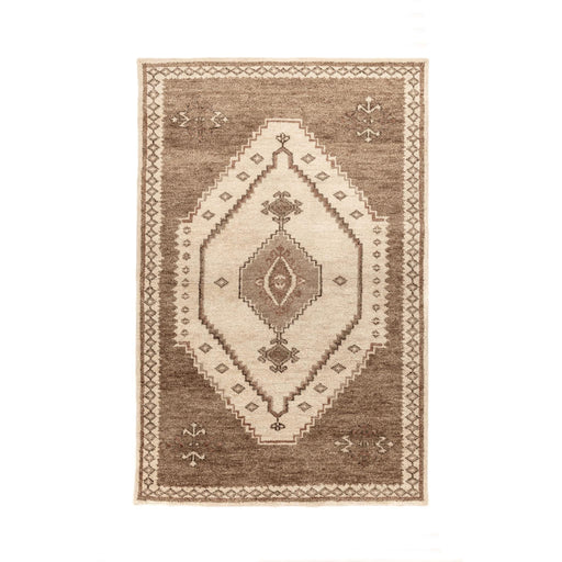Hand-knotted Luxor area rug by Classic Home featuring intricate patterns and rich colors, perfect for adding elegance to a living space.