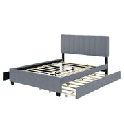DreamHaus platform upholstered storage bed with two drawers and twin long trundle, featuring a padded headboard and sleek design.