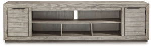 Naydell - XL TV Stand w/Fireplace Option - Gray - R&R Furniture Gallery (Fountain Valley, CA)