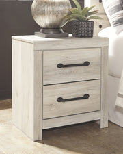 Signature Design by Ashley Cambeck youth bedroom set with bed, dresser, and additional furniture pieces in a modern bedroom scene.