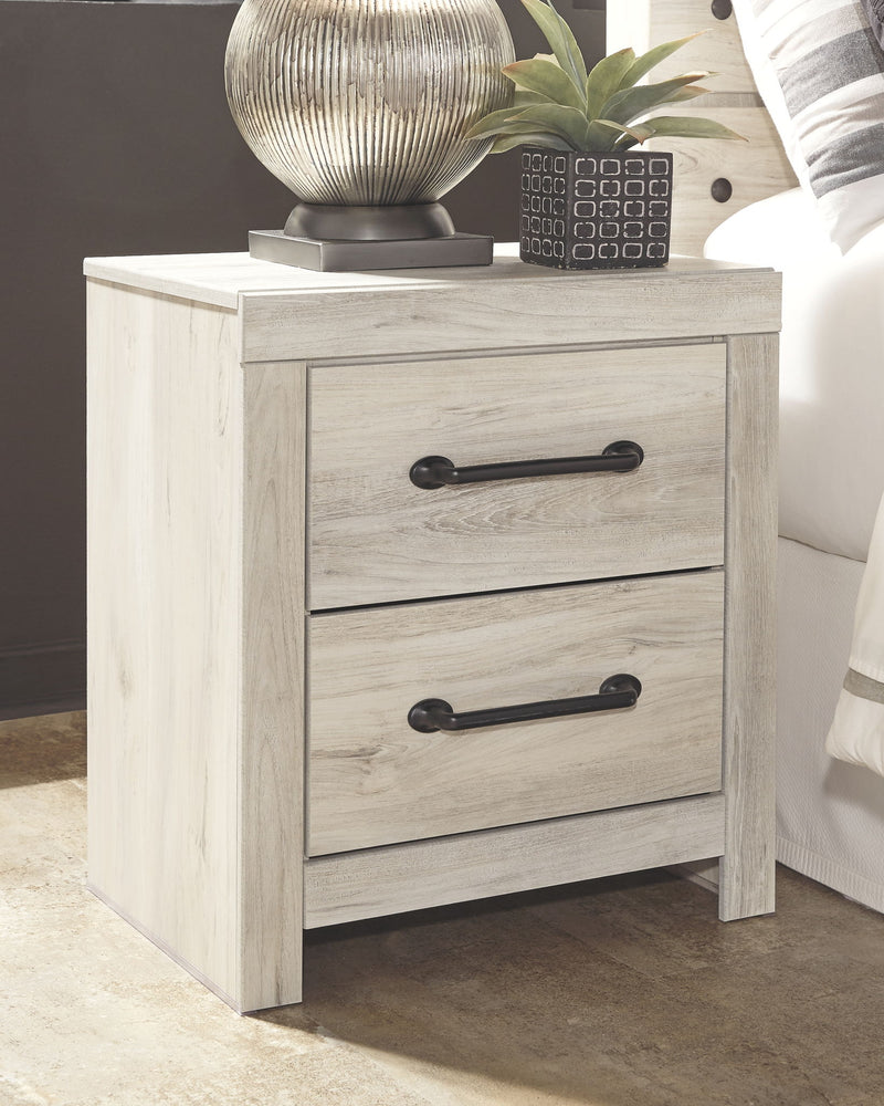 Signature Design by Ashley Cambeck youth bedroom set with bed, dresser, and additional furniture pieces in a modern bedroom scene.