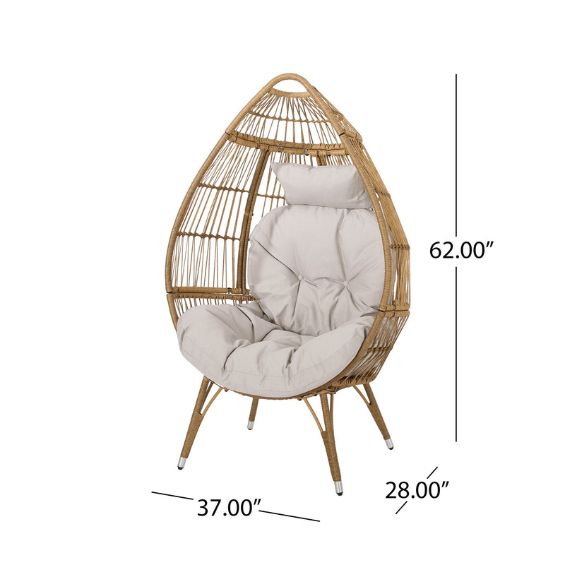 Noble House basket accent chair with teardrop shape and water-resistant cushion in natural finish, ideal for indoor or outdoor use.