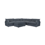 Classic Home Caplan 6-piece modular sectional with ottoman in neutral fabric, arranged for a modern living room setting.