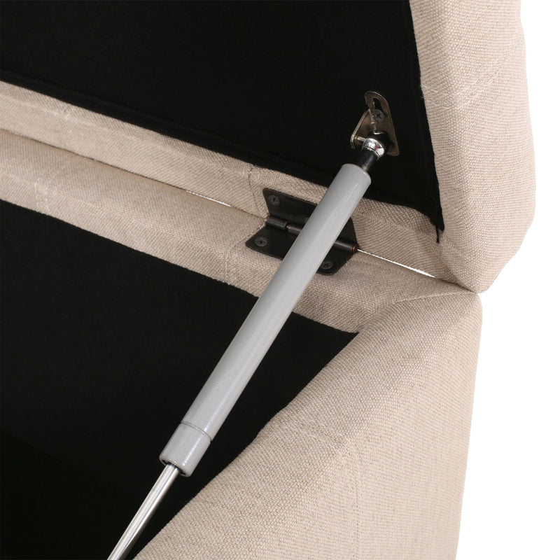 Contemporary Noble House Isabella storage ottoman with beige fabric upholstery and built-in storage compartment.