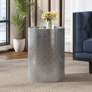 Noble House modern round accent table with hammered surface and sleek design, ideal for contemporary living spaces.