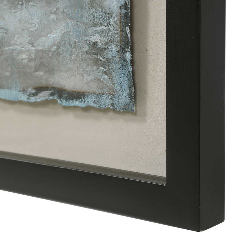 Set of three blue painted metal wall decor art pieces featuring ocean swell designs by Uttermost.