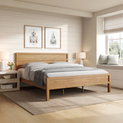Ridgecrest Home Maddox panel bed with wooden frame and headboard, showcasing a modern design in a bedroom setting.