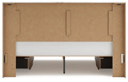 Signature Design by Ashley Lawroy panel bed with built-in storage drawers in a modern bedroom setting.