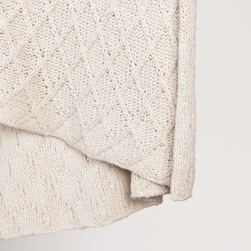Ivory Catalina throw blanket by Classic Home, soft and cozy throw for sofa or bed, featuring a plush fabric texture.