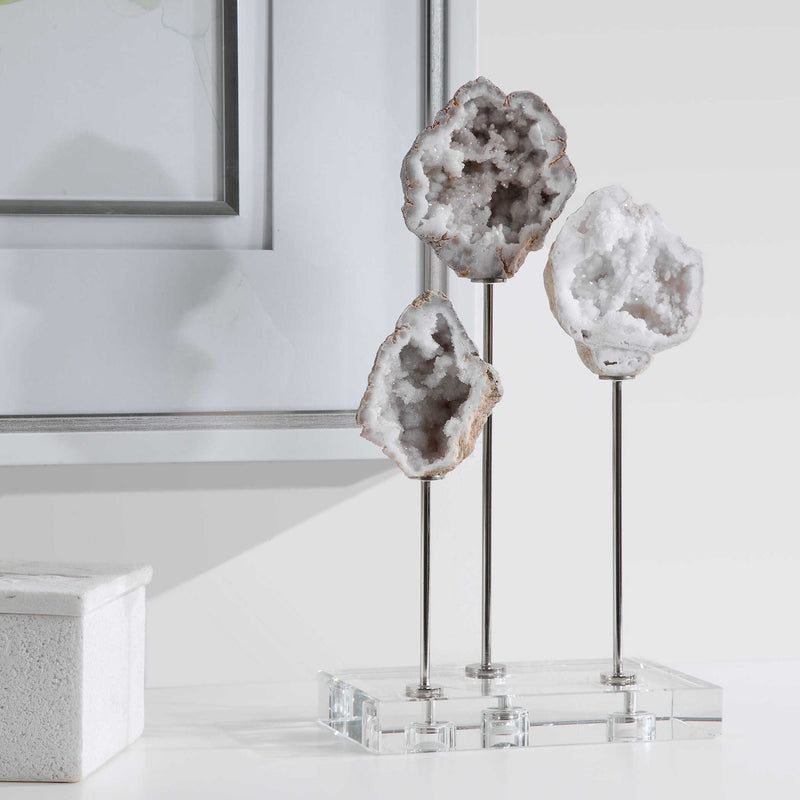 White natural stone sculpture from Uttermost's Cyrene collection, featuring a detailed and elegant figurine for home decor.