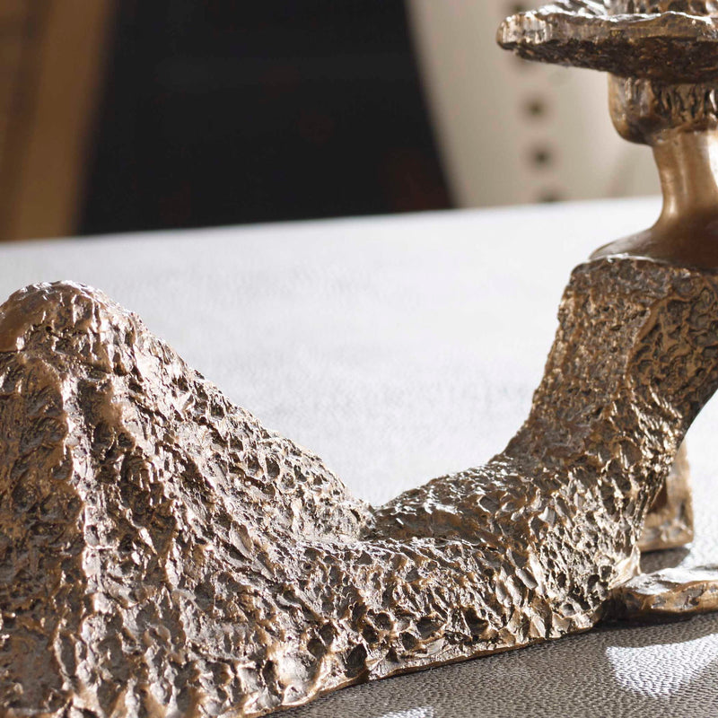 Antique bronze sculpture titled Summer Days by Uttermost, featuring a detailed figurine with a delicate, artistic design.
