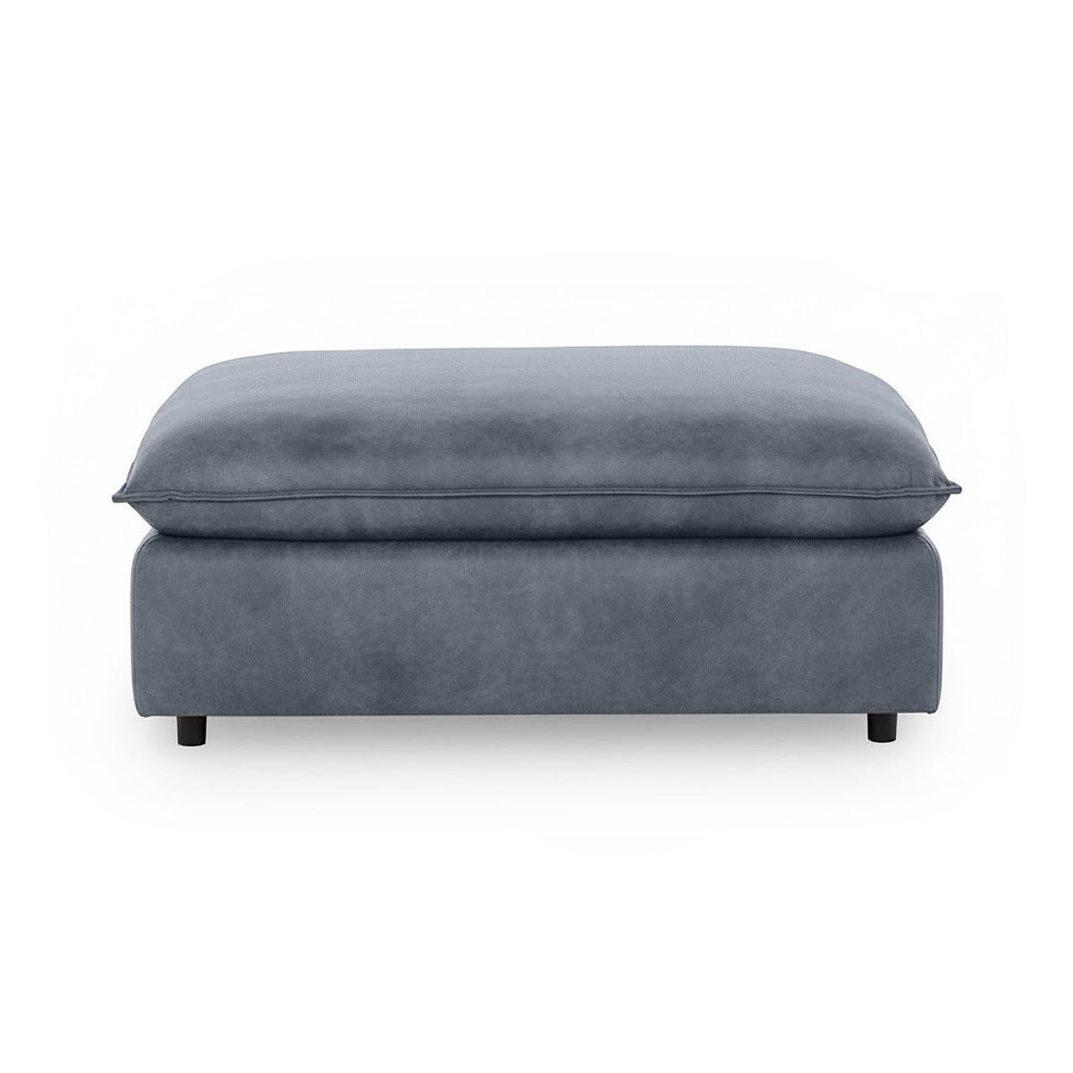 Classic Home Caplan upholstered ottoman with cushioned top and wooden legs, versatile accent piece for living rooms.