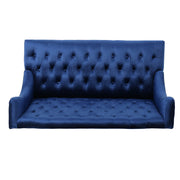 Noble House upholstered loveseat with wingback design and diamond tufting, featuring plush fabric and stylish craftsmanship.