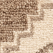 Classic Home Luxor hand-knotted area rug with intricate geometric patterns in rich earthy tones, ideal for living room decor.