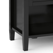 Handcrafted warm wood bedside table from Simpli-Home, accent nightstand with storage drawer and modern design.
