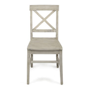 Set of two Noble House Plethora dining chairs with X-shaped back design, modern wooden frame, and comfortable seating.