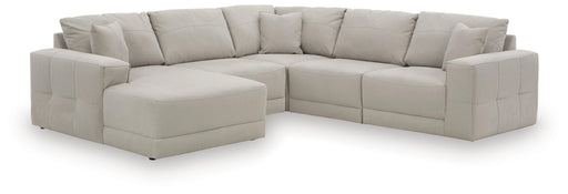 Benchcraft Next-Gen Gaucho stationary sectional sofa with plush cushions and modern design, shown in a stylish living room setting.
