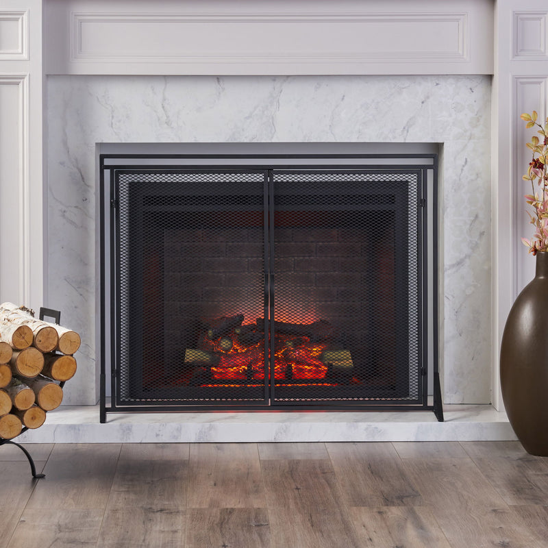 Noble House Samantha iron fireplace screen with two-door design, decorative metal framework for protecting and accenting a fireplace.