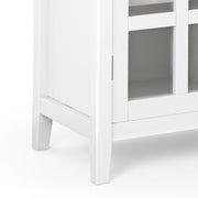 Handcrafted Acadian medium storage cabinet by Simpli-Home, accent cabinet with wood finish and multiple storage compartments.
