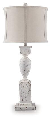 Modern Madsbrook poly floor lamp by Signature Design by Ashley with a sleek base and fabric shade for stylish lighting.