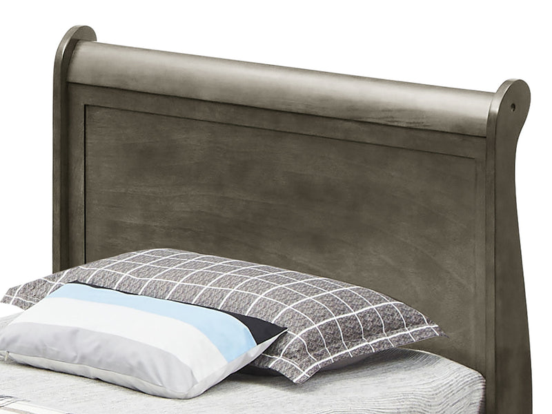 Elegant Glory Furniture trundle bed with a classic design, featuring a wooden frame and a pull-out bed for versatile sleeping options.