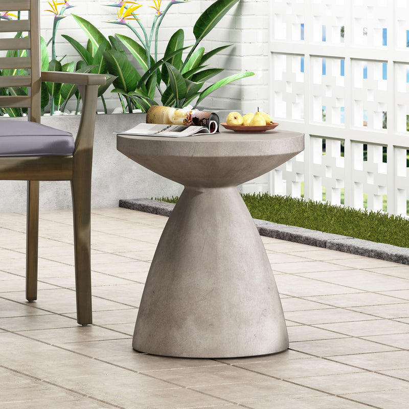 Noble House outdoor and indoor lightweight concrete side table with a modern round design and smooth surface.