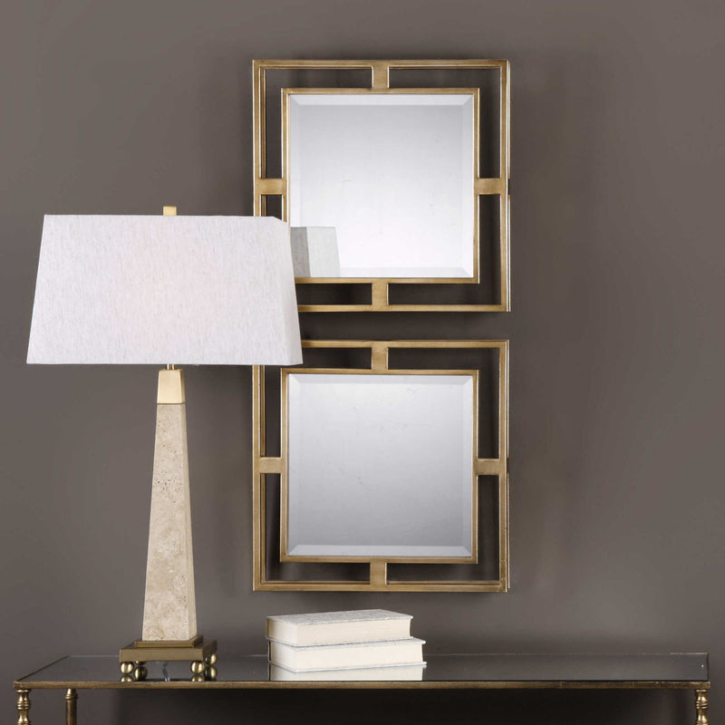 Pair of gold square wall mirrors by Uttermost, featuring sleek geometric design, perfect for modern home decor.