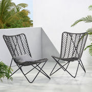 Set of two gray outdoor wicker chairs with geometric cross metal bases by Noble House, ideal for patio or garden seating.