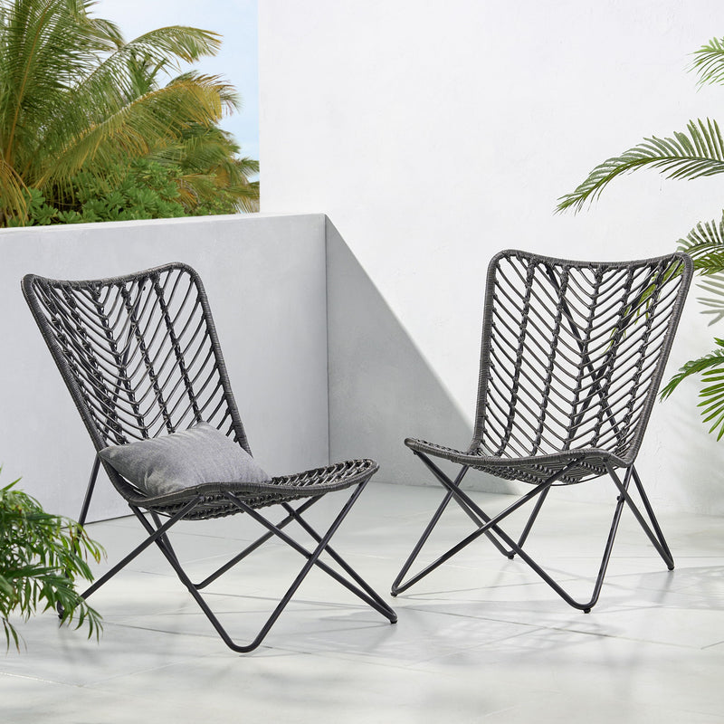 Set of two gray outdoor wicker chairs with geometric cross metal bases by Noble House, ideal for patio or garden seating.