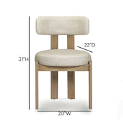 TOV Furniture Odessa dining side chair with upholstered seat and sleek wooden legs, modern design for dining rooms.