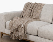 Classic Home Porter throw blanket with cozy, textured fabric in neutral tones, perfect for adding warmth and style to your space.