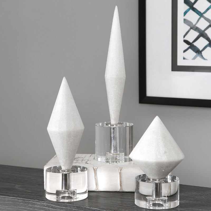Set of three Alize sculptures by Uttermost featuring modern abstract figurines in neutral tones for decorative display.