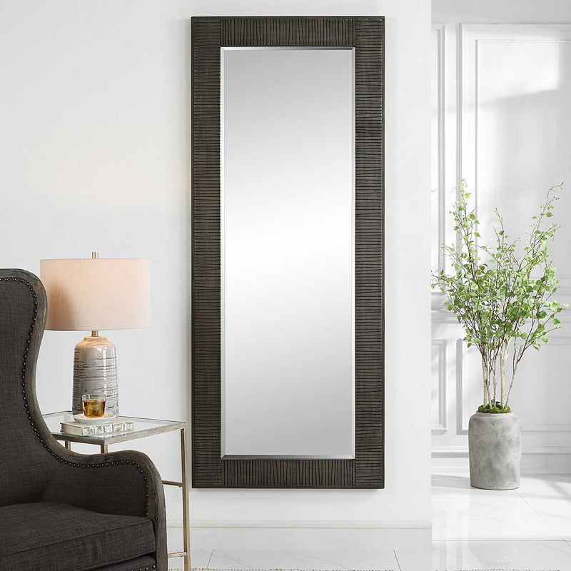 Gray Figaro oversized accent mirror by Uttermost with a modern, bold frame, reflecting contemporary interior decor.