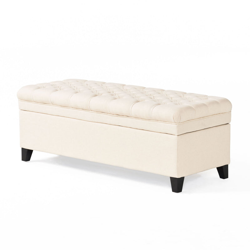 Noble House Juliana storage ottoman with birch wood legs, cushioned top, and spacious interior for versatile home storage.