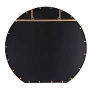 Uttermost Cabell wall mirror with a sleek frame, hanging on a wall, showcasing modern design and reflective glass.
