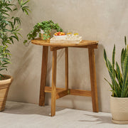 Outdoor Noble House half round folding bistro table made of acacia wood, perfect for patio or garden dining spaces.
