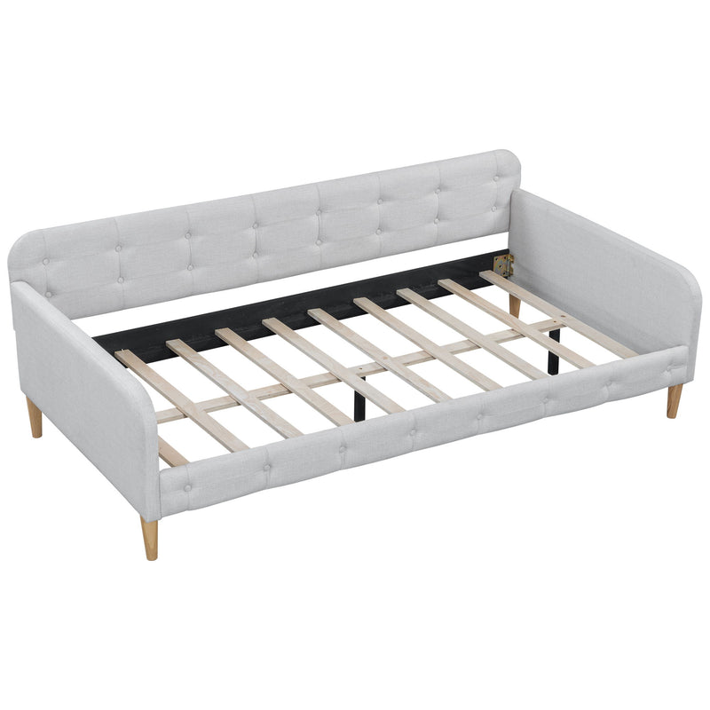Dreamland upholstered modern daybed with plush fabric, featuring a sleek frame and comfortable seating for living or guest rooms.